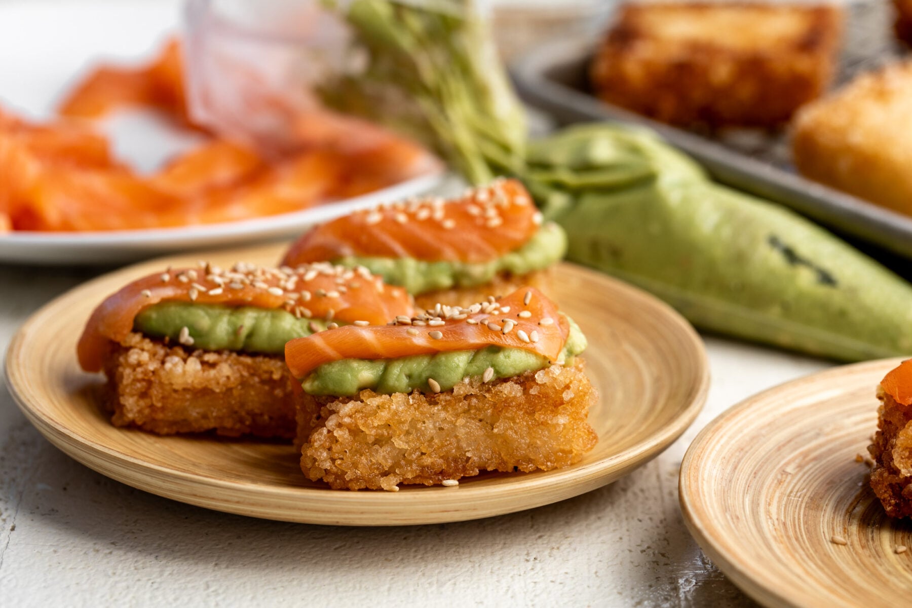 crispy rice with salmon and avocado puree.