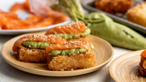 crispy rice with salmon and avocado puree.