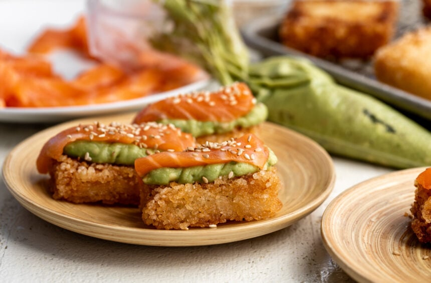 crispy rice with salmon and avocado puree.