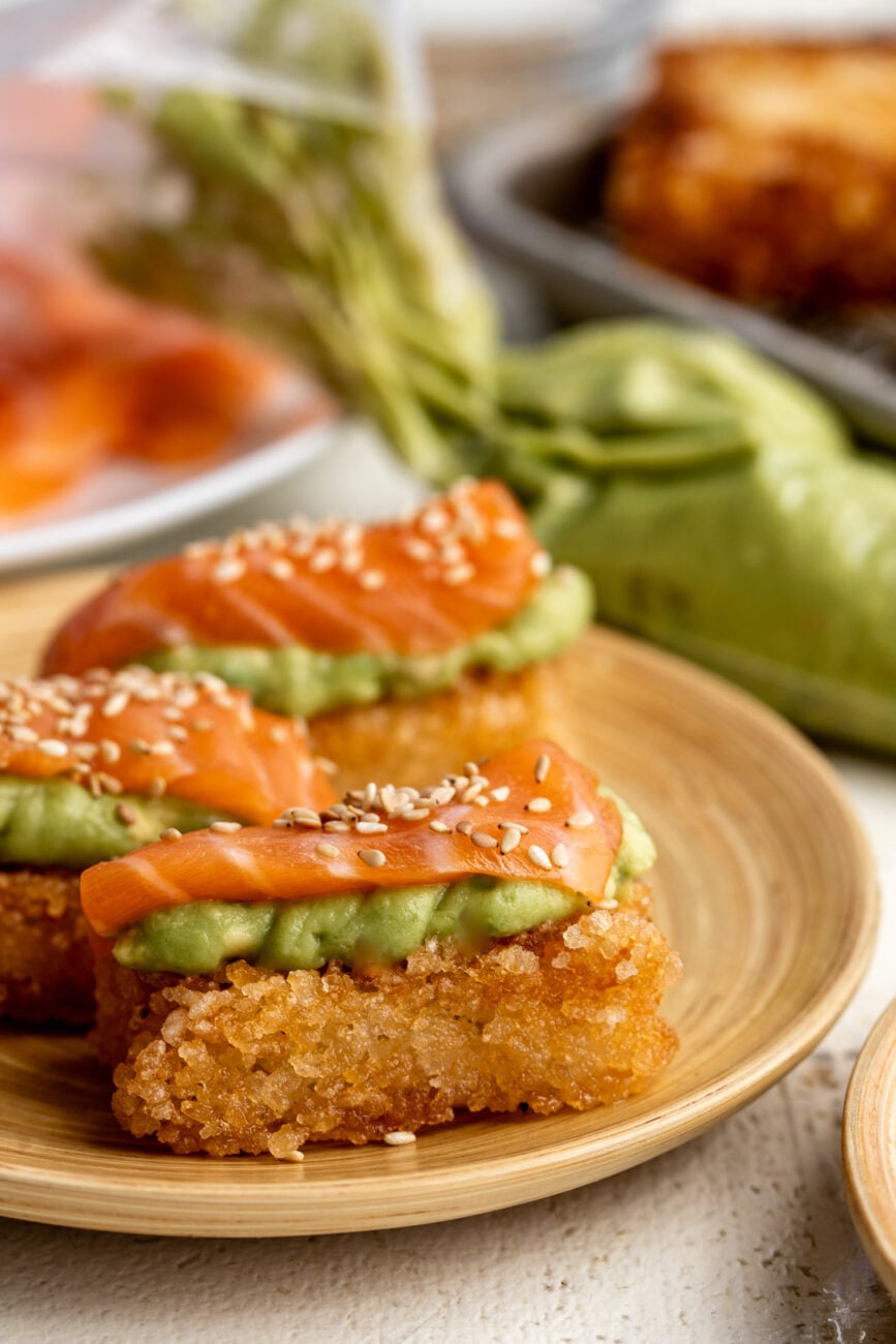 crispy rice with salmon and avocado puree.
