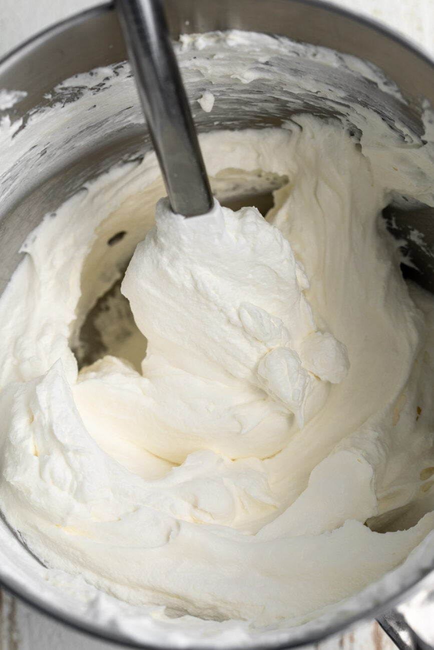 bowl of whipped cream with mascarpone folded in.