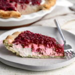 Raspberry Cream Pie Recipe (Briarmere Farms Copycat) piece on plate.