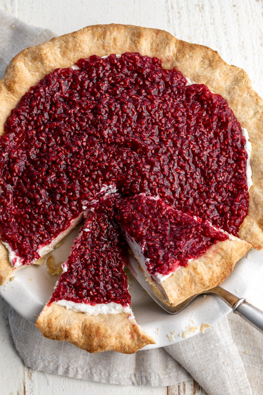 briermere farms raspberry cream pie slices cut in pie plate.