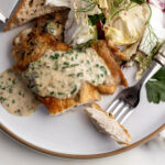 brick chicken with creamy herb pan sauce.