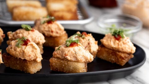 dynamite lobster crispy rice topped with sriracha and green onion.