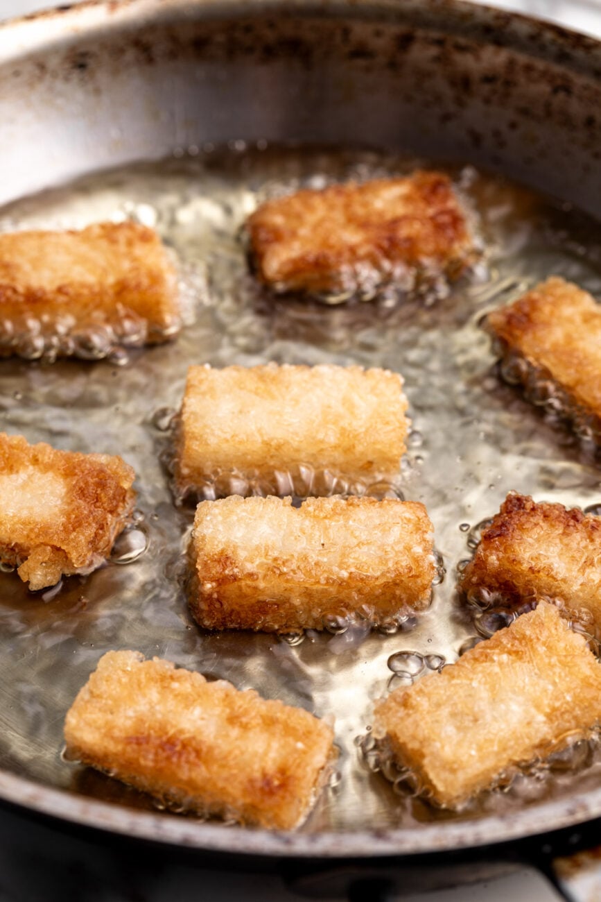 fried rectangles of crispy sushi rice in oil.