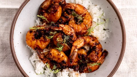 honey garlic chili crisp shrimp over white rice.