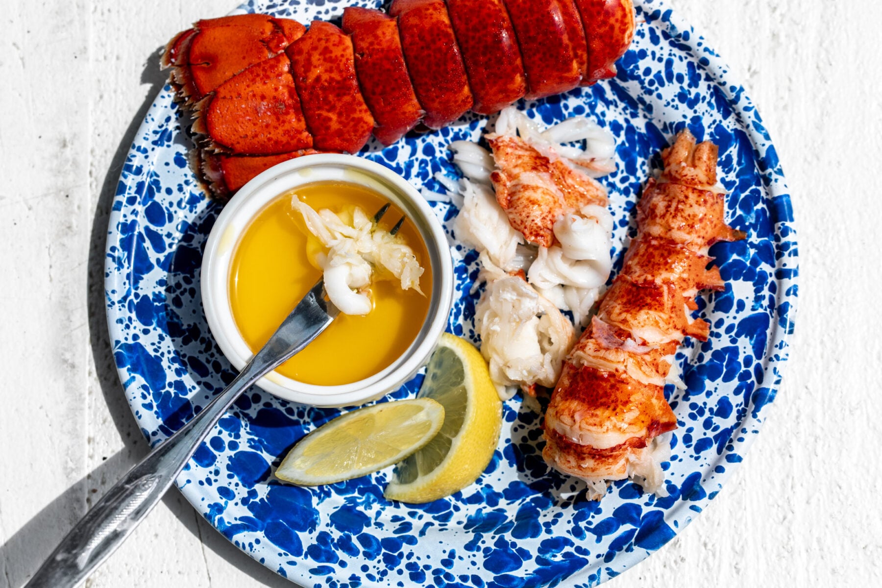 how to boil lobster tails with lemon wedge and clarified butter.
