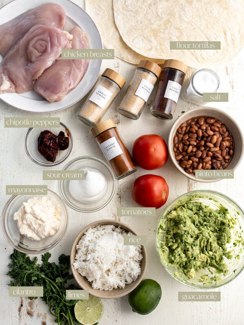 creamy chipotle chicken burrito ingredient flatlay.