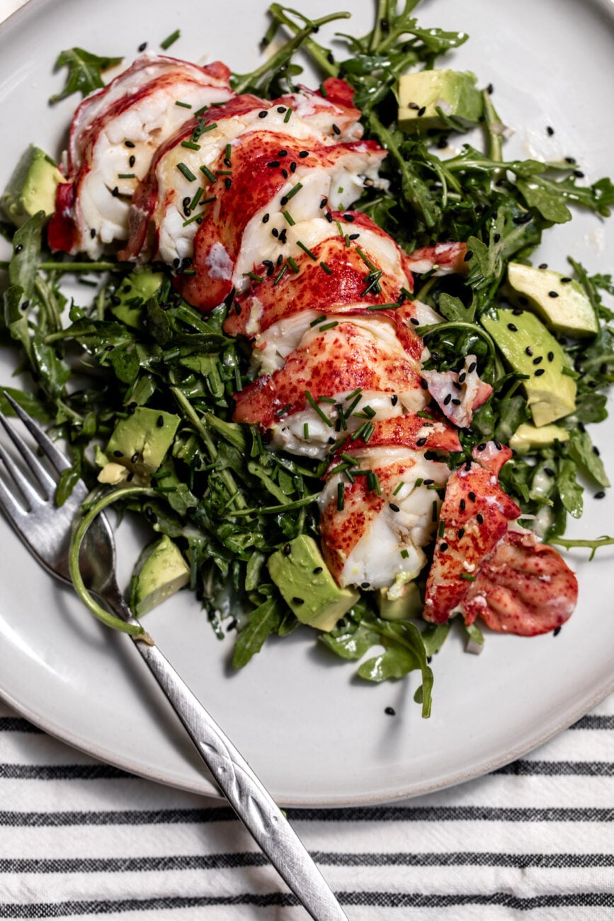 lobster avocado salad with creamy tofu lime dressing and avocado.
