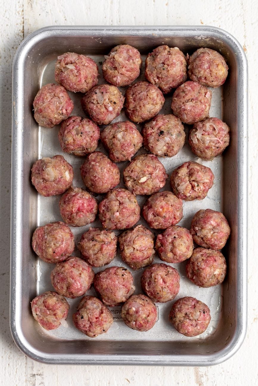 beef mini meatballs on baking sheet.